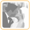 This is an image used for Christy and Tim's website.  It is a grayscaled headshot of a bride and groom kissing.